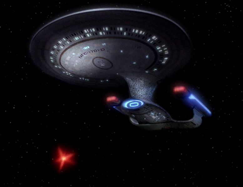 The Enterprise shooting a photon torpedo.